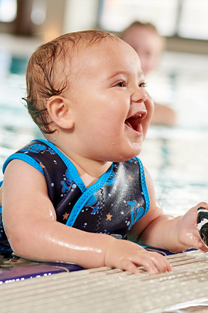 baby in the swimming pool at water babies lesson