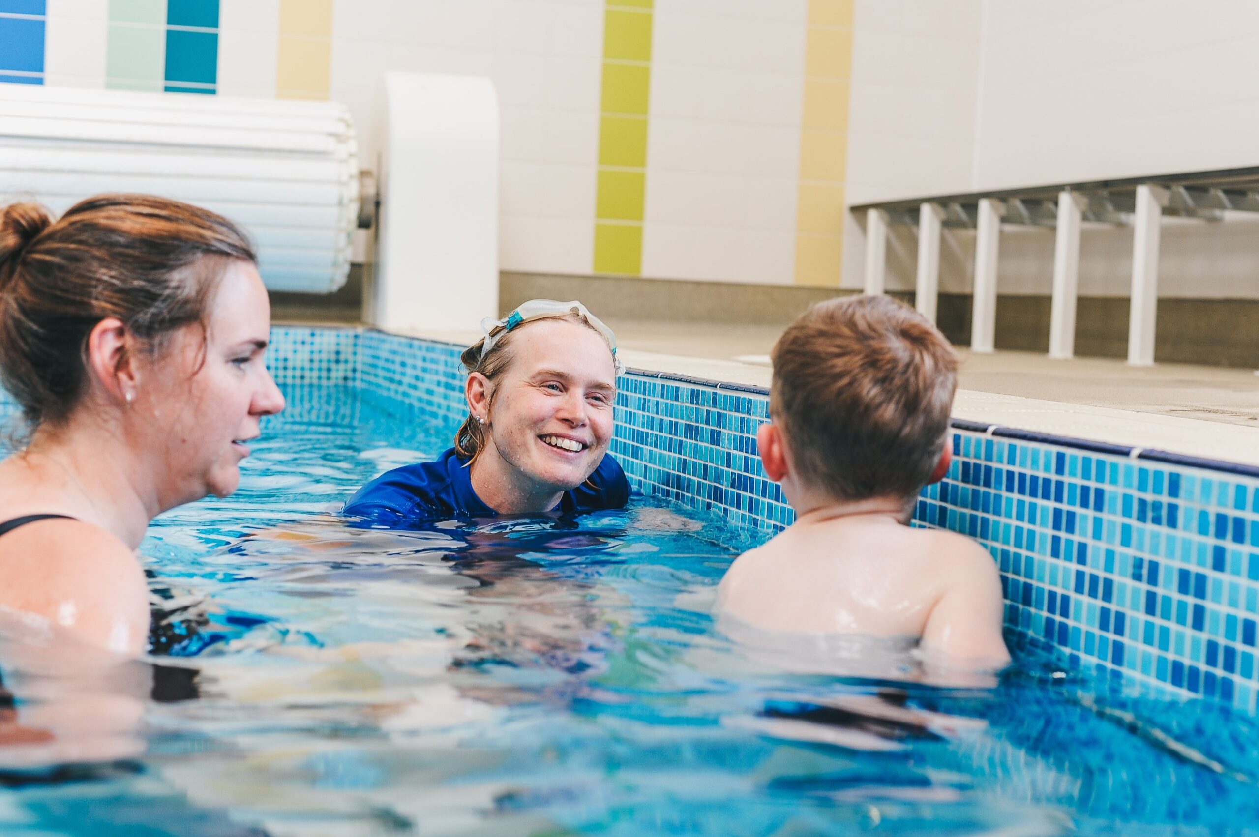 water babies teacher with mum and toddler in lesson