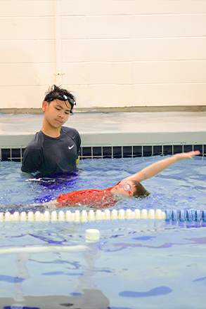 water babies swimvincible teacher with toddler in the pool