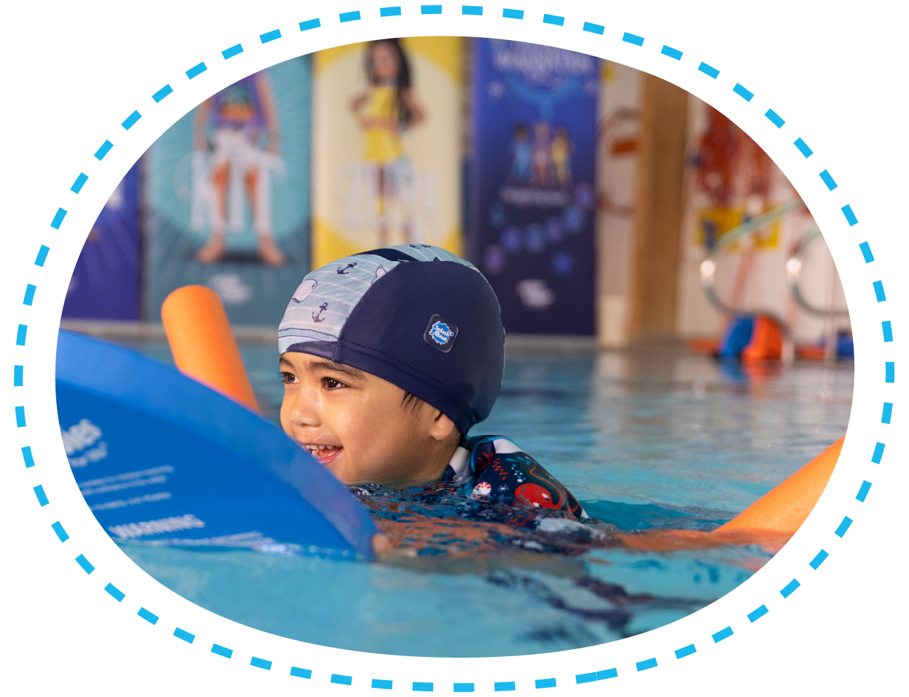 child swimming with floats